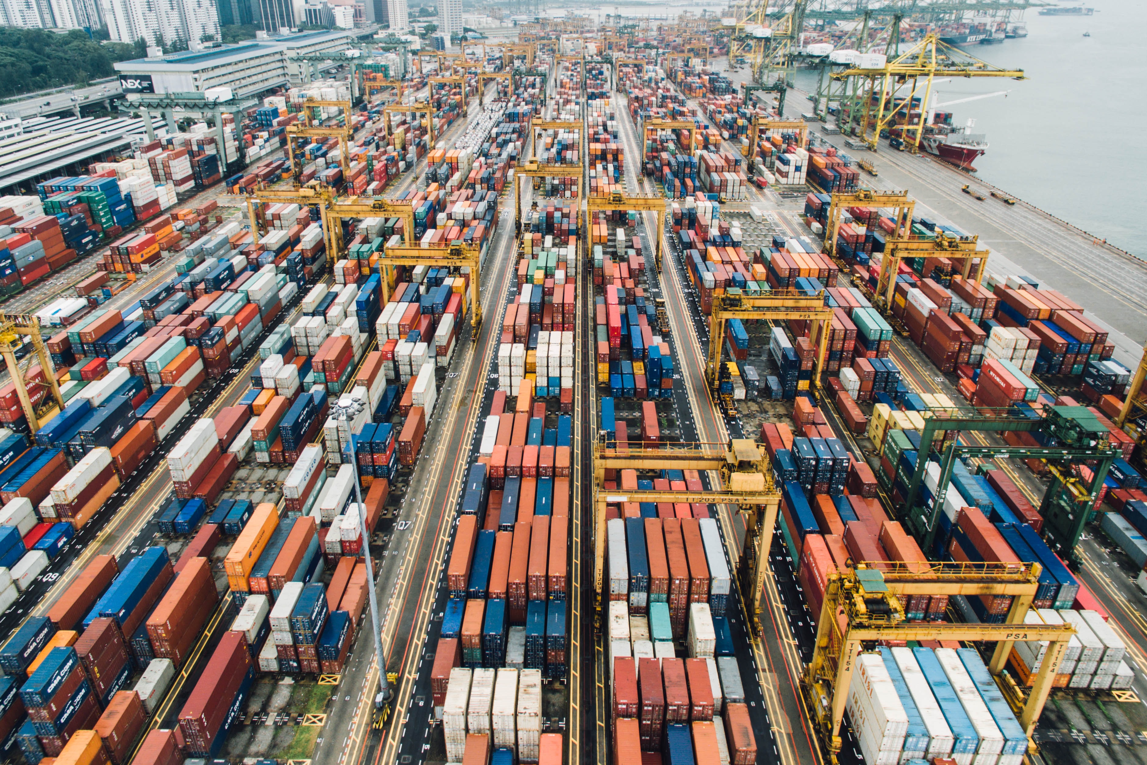 A shipping yard full of shipping containers.